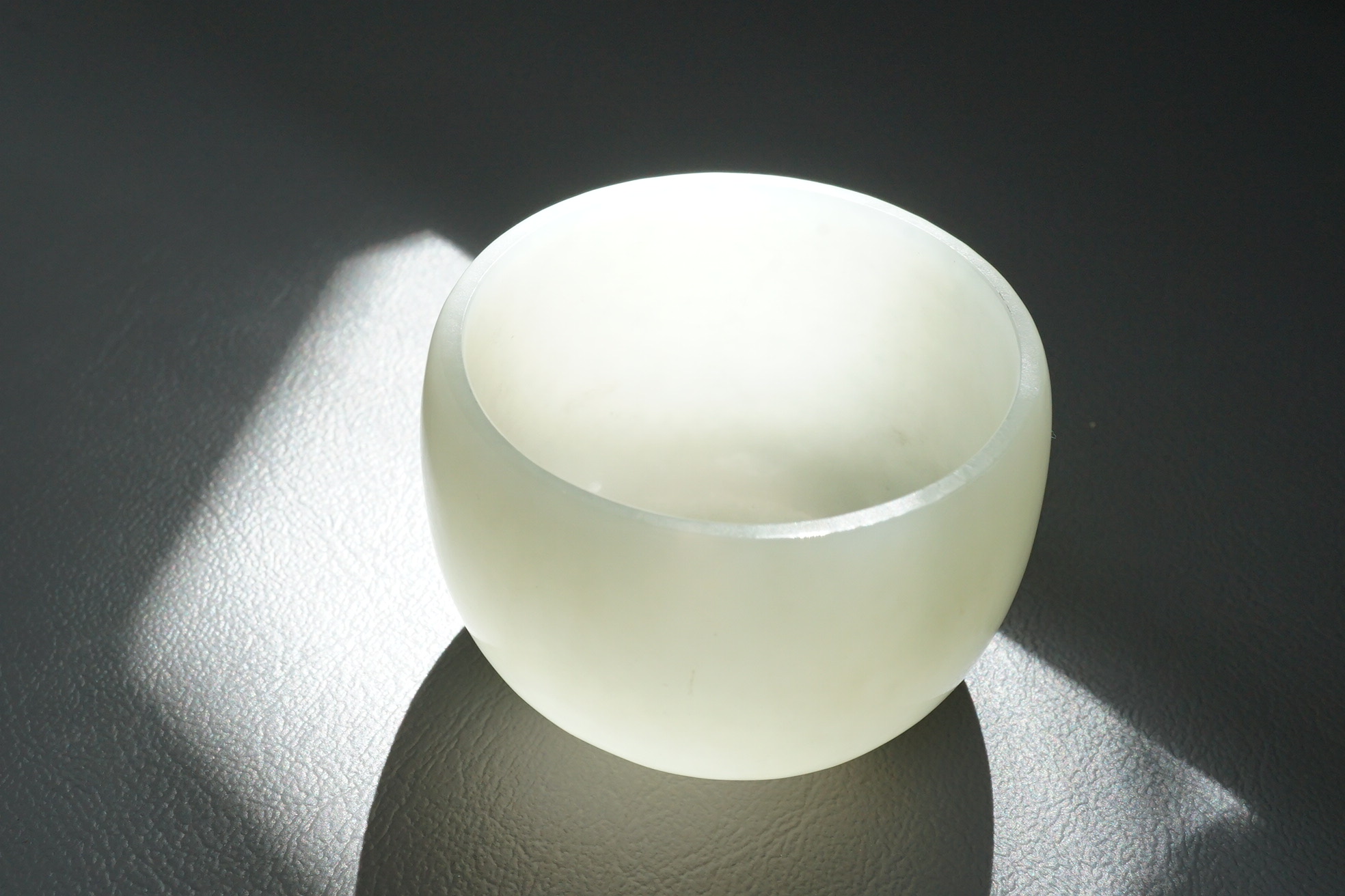 A pair of Chinese white jade cups, Qing dynasty or later